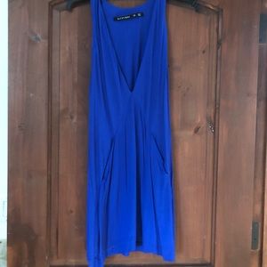 Blue plunging midi dress.